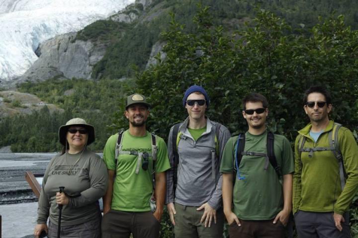Hikers near the toe of Exit Glacier in Seward, Alaska