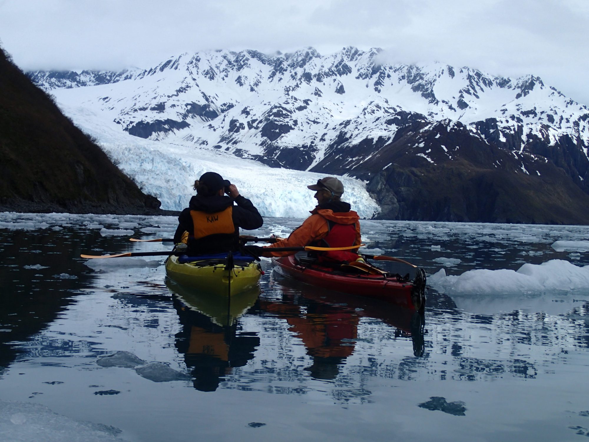 OLYMPUS DIGITAL CAMERA Kayakers using binoculars in Kenai Fjords National Park